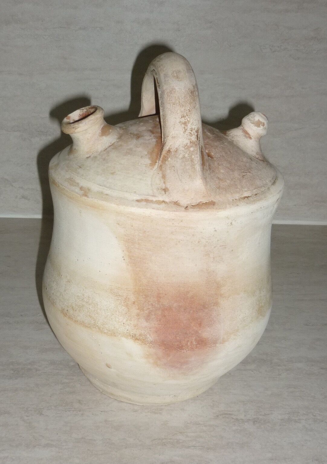 Ancient natural terracotta jug