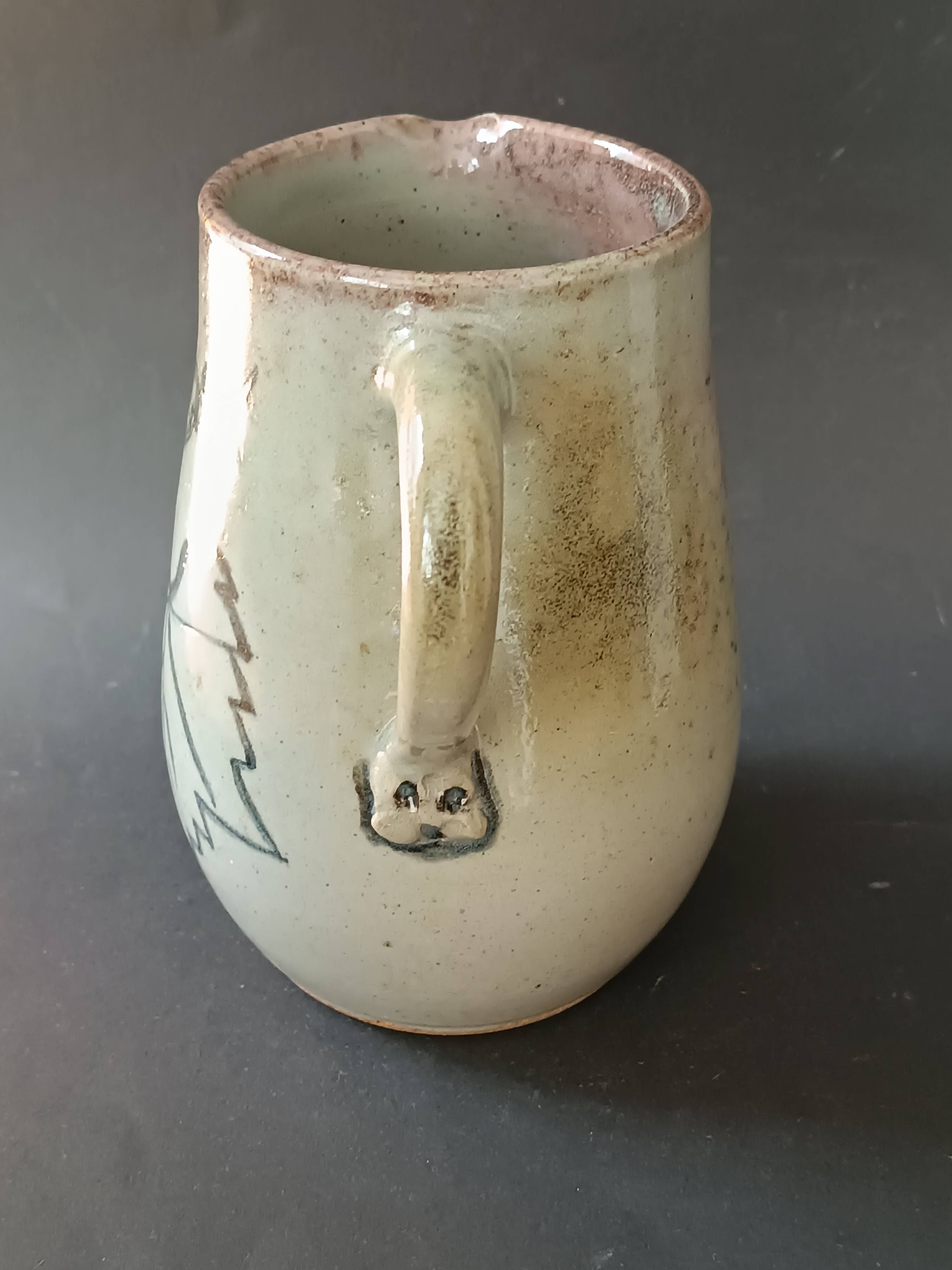 Stoneware pitcher from Alsace, incised decoration of vine by Louis Buecher 1986.