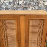 Rattan wardrobe and its compass-legged chest of drawers, 1960