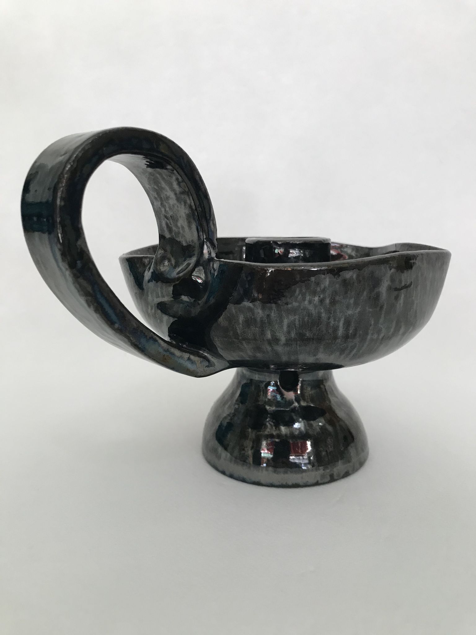 Black "hand- bougeoir with iridescents signed Fazio in Vallauris, circa 1950-1960