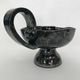 Black "hand- bougeoir with iridescents signed Fazio in Vallauris, circa 1950-1960