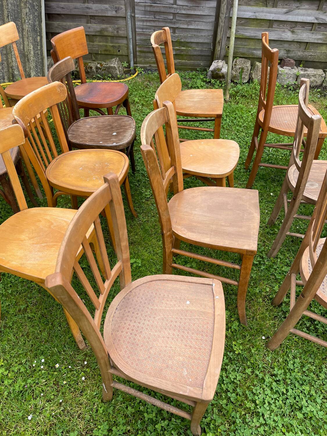 Lot of 16 mismatched bistro chairs