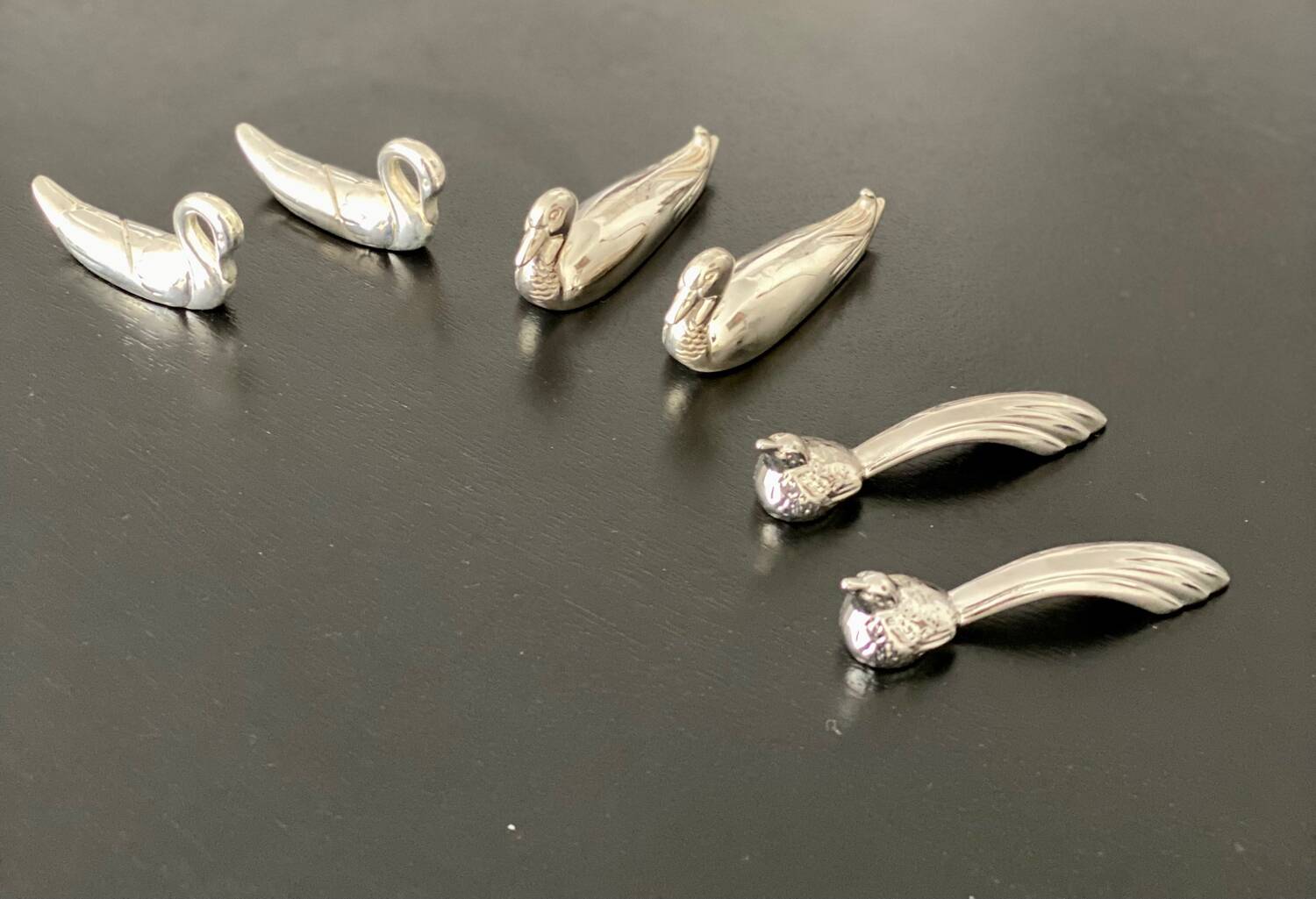6 various animal shaped knife holders in silver metal