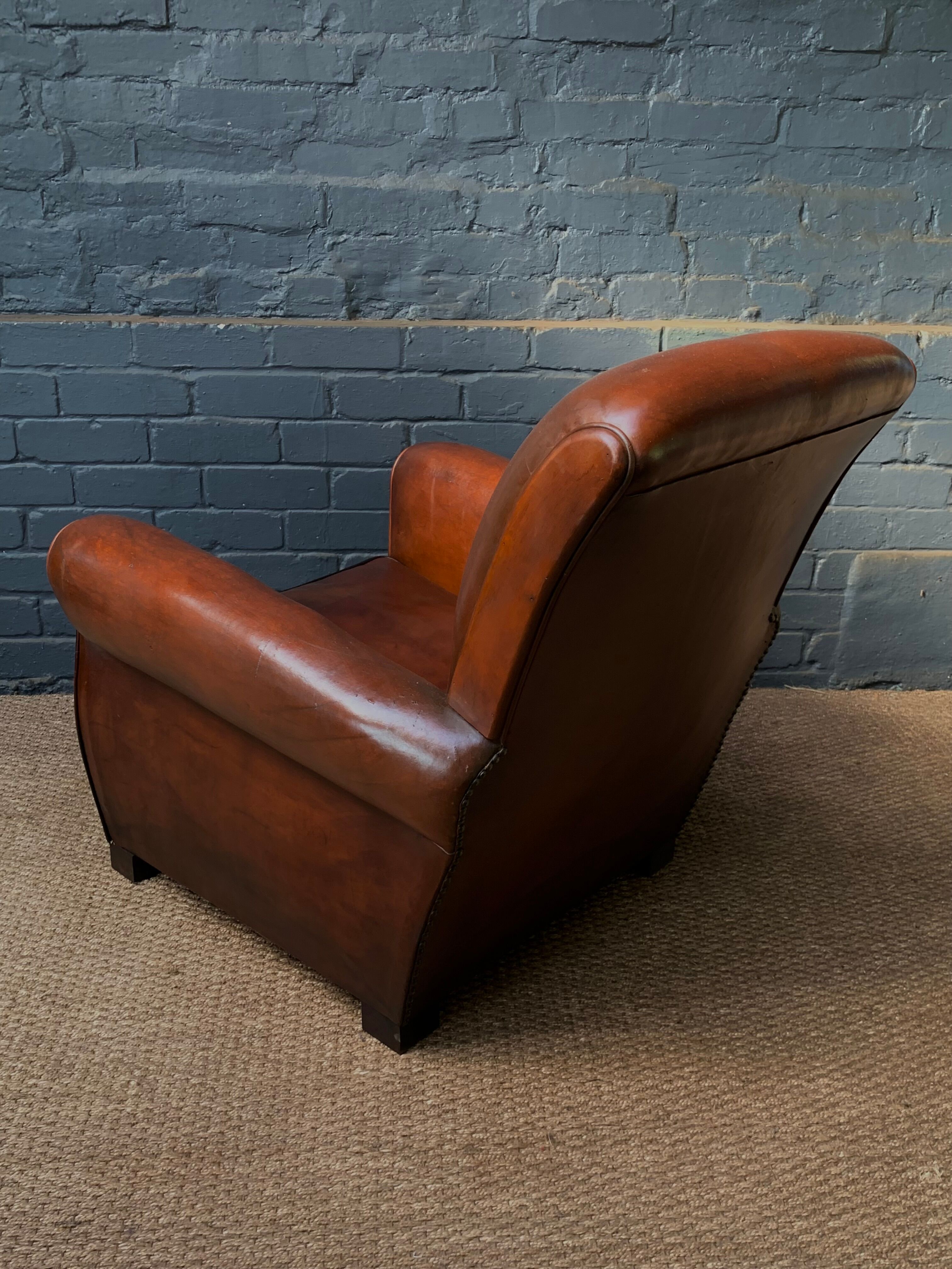 French, leather club chair, havana lounge model circa 1950's