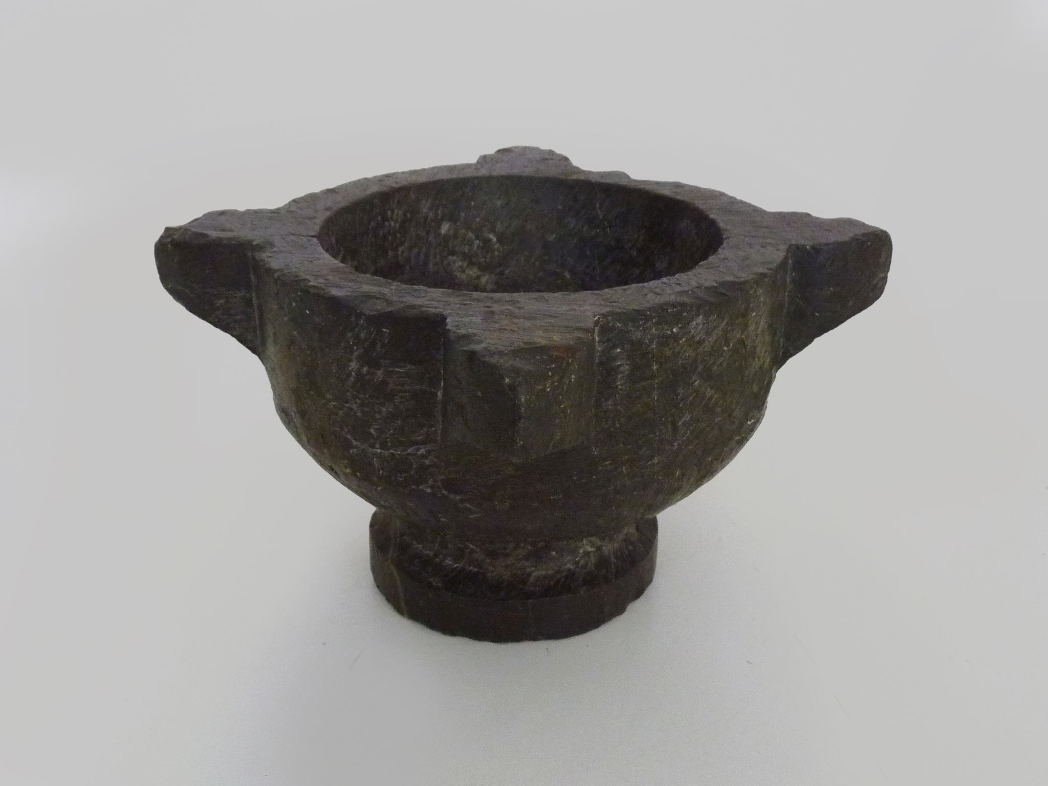 Old black marble apothecary mortar