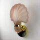 Pair of Art Deco shell wall sconces – amber glass, France 1970s