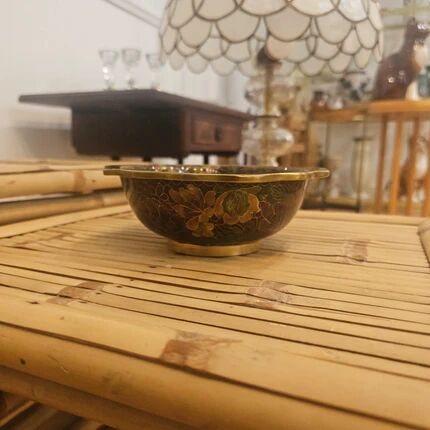 Vintage Asian brass bowl with floral decoration.