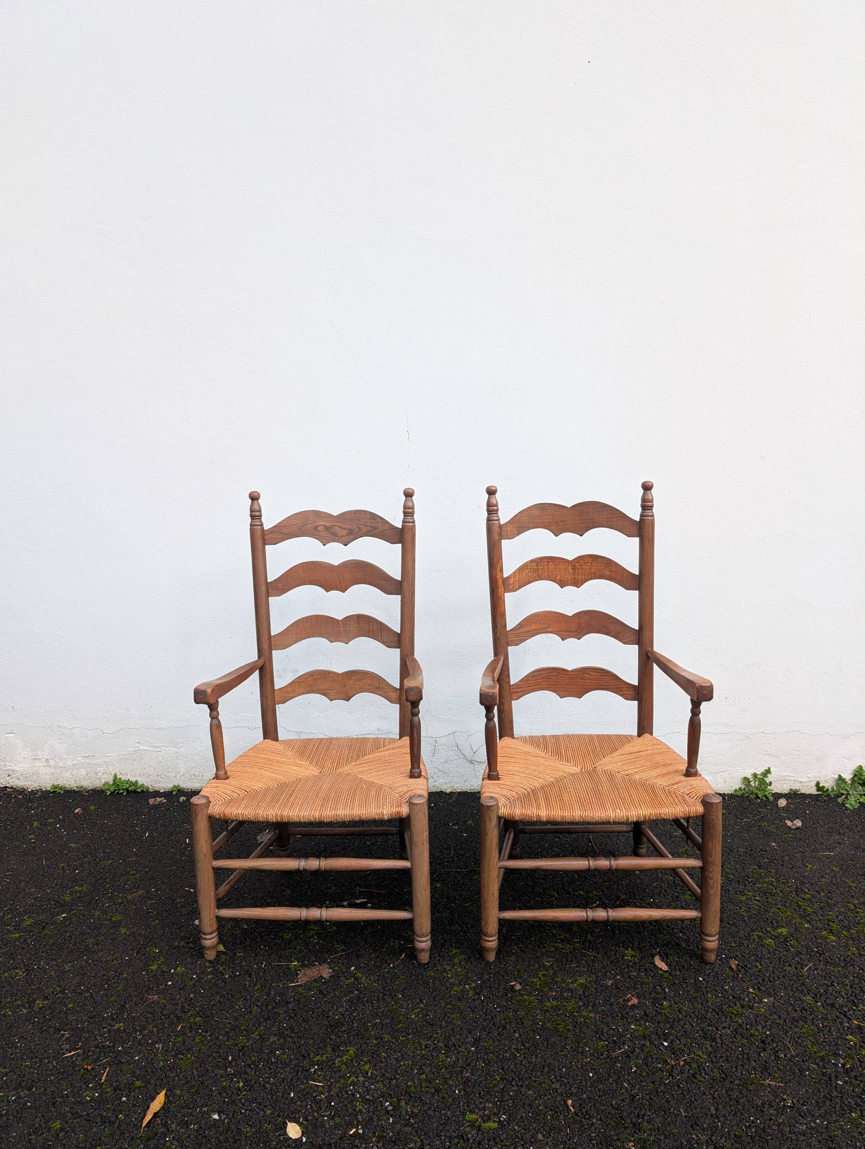 Pair of straw armchairs