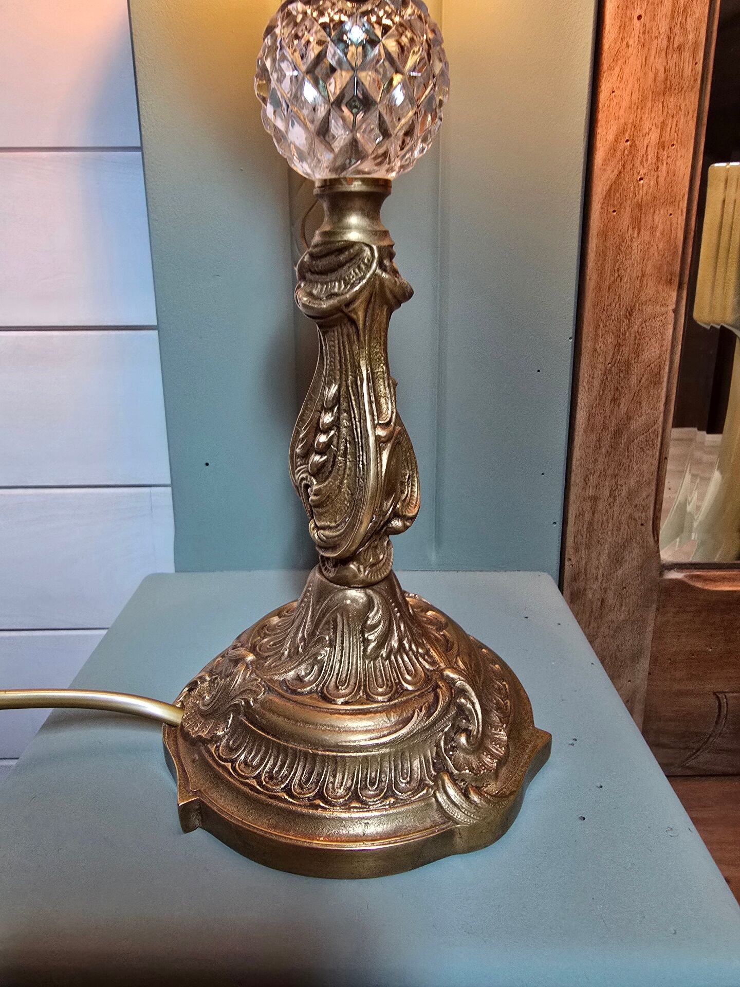 Brass floor lamp with a glass ball, cut glass globe.