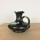 Thulin Belgium pitcher, black ceramic handle