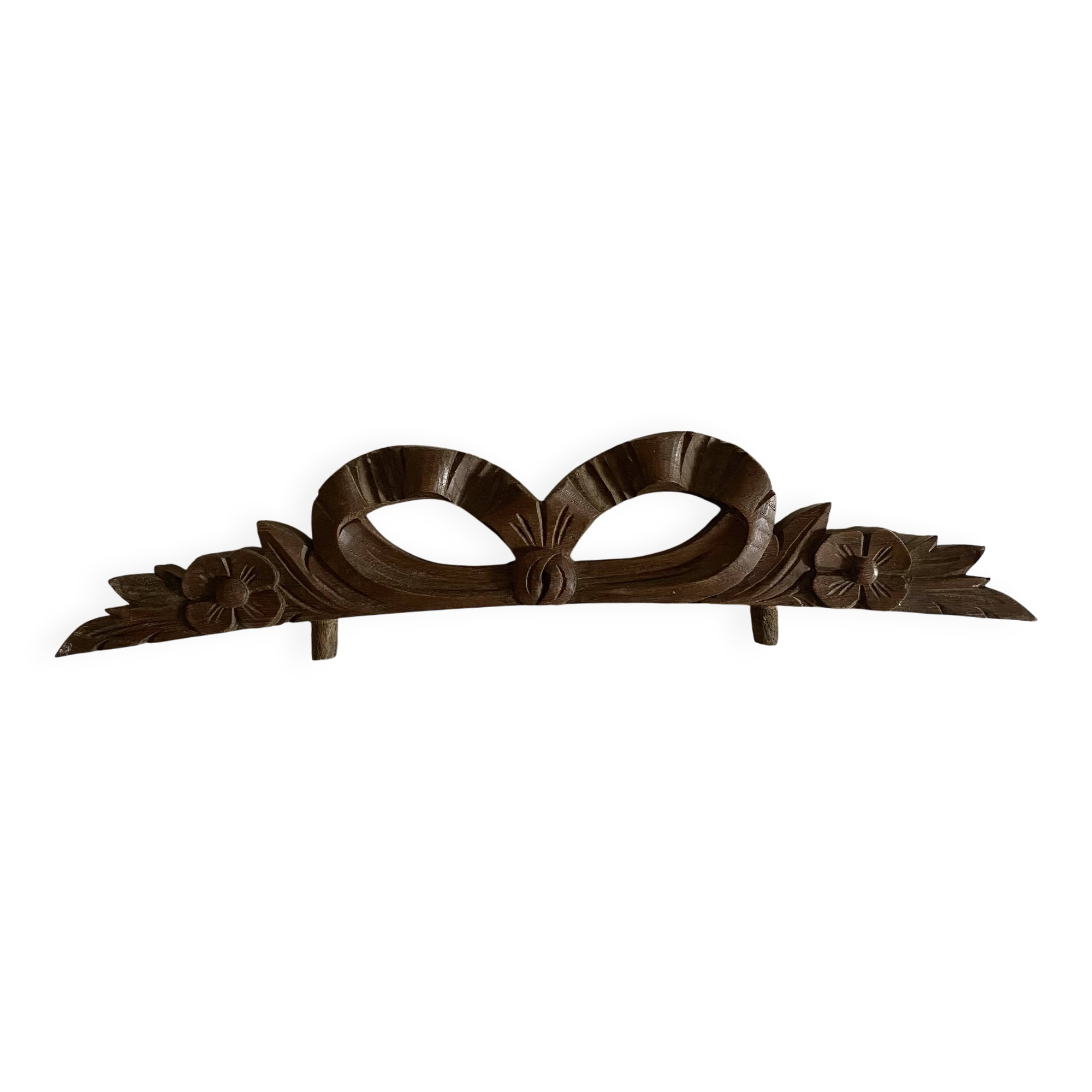 Antique carved wooden ribbon pediment