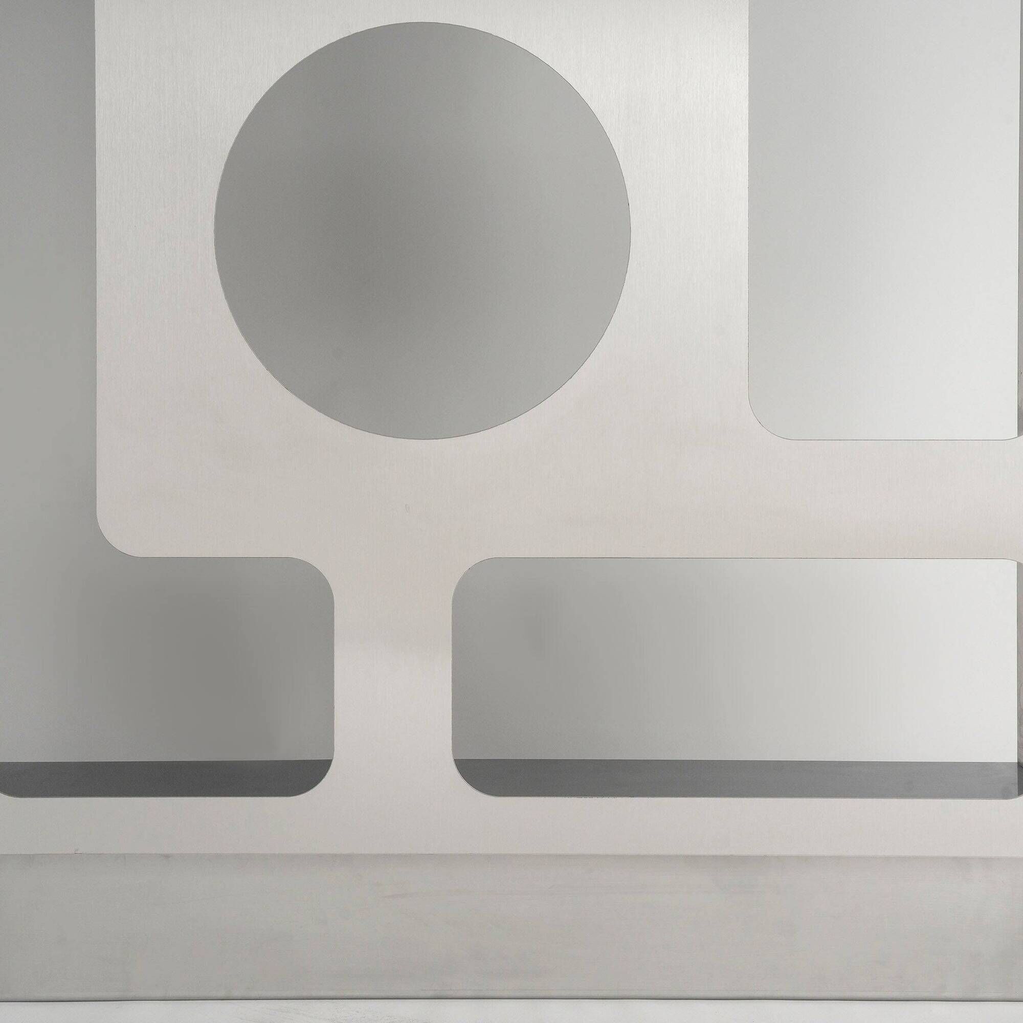 Pair of perforated brushed stainless steel screens, contemporary French work.