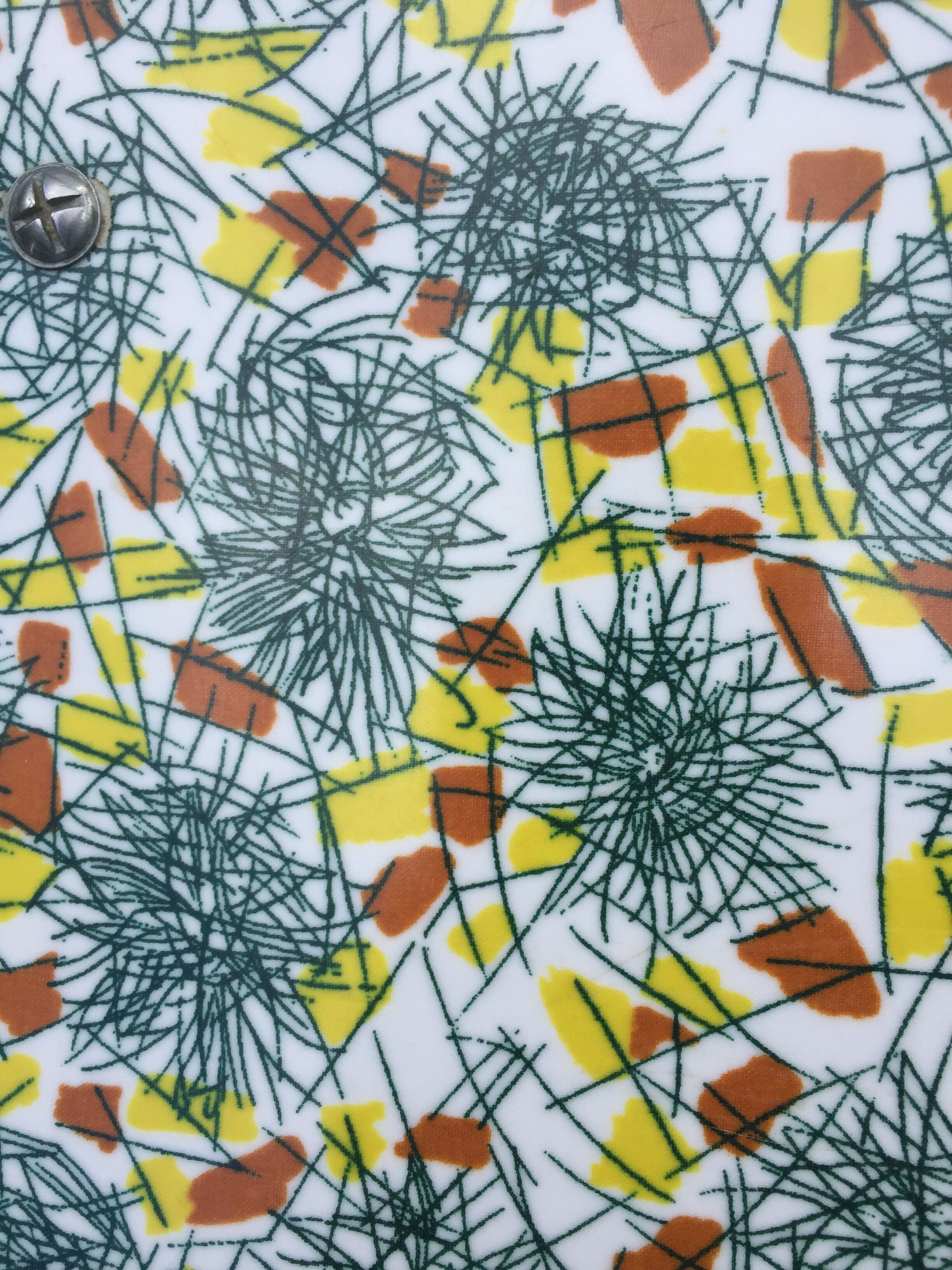 Duo of chairs formica patterns flowers graffiti