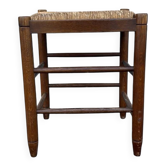 Tabouret vintage avec assise en paille