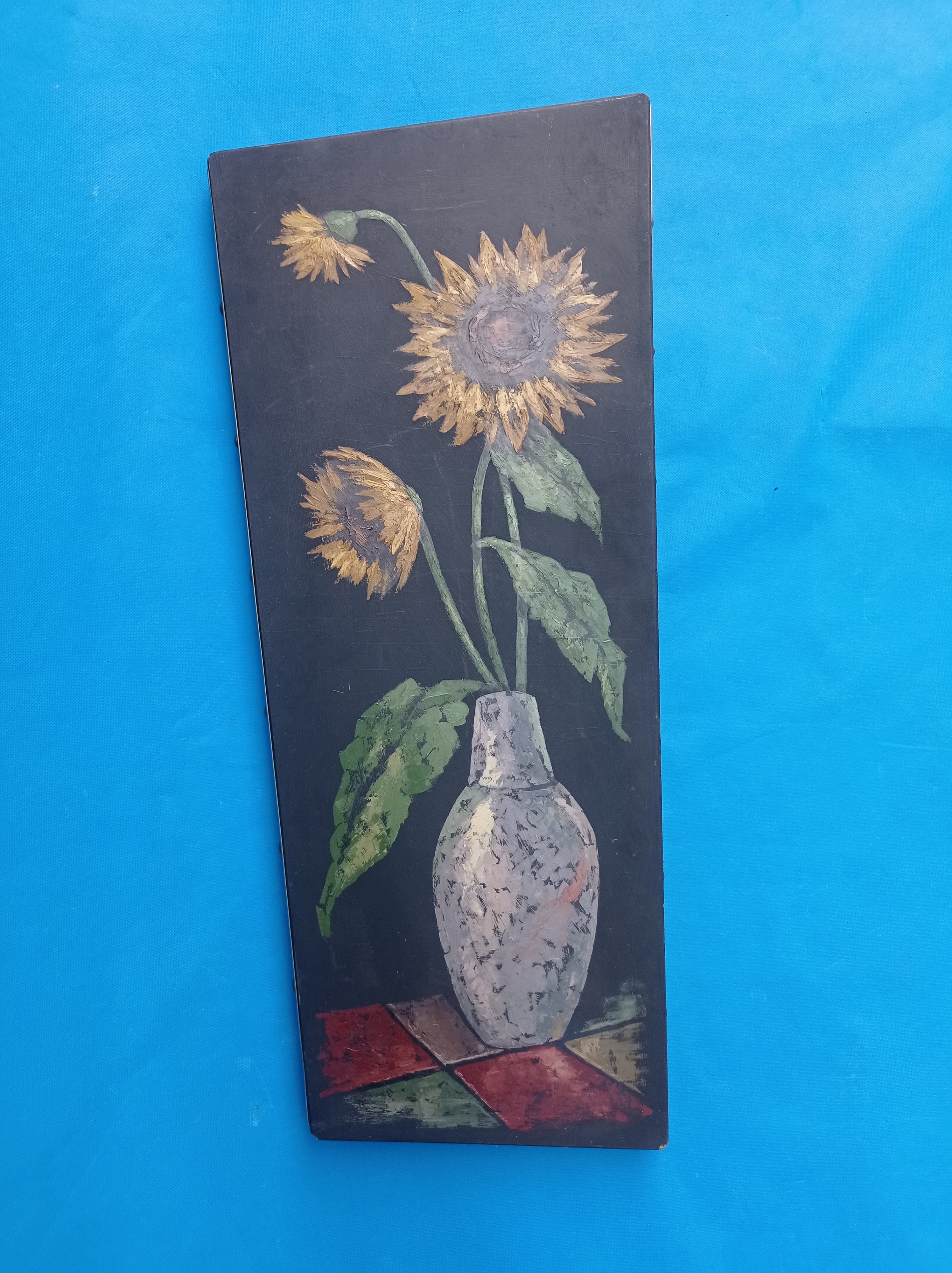 Painting of sunflowers in a vase comes from the 60's / 70's
