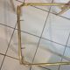 Trio of vintage golden nesting tables