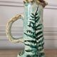 Antique handcrafted ceramic pitcher