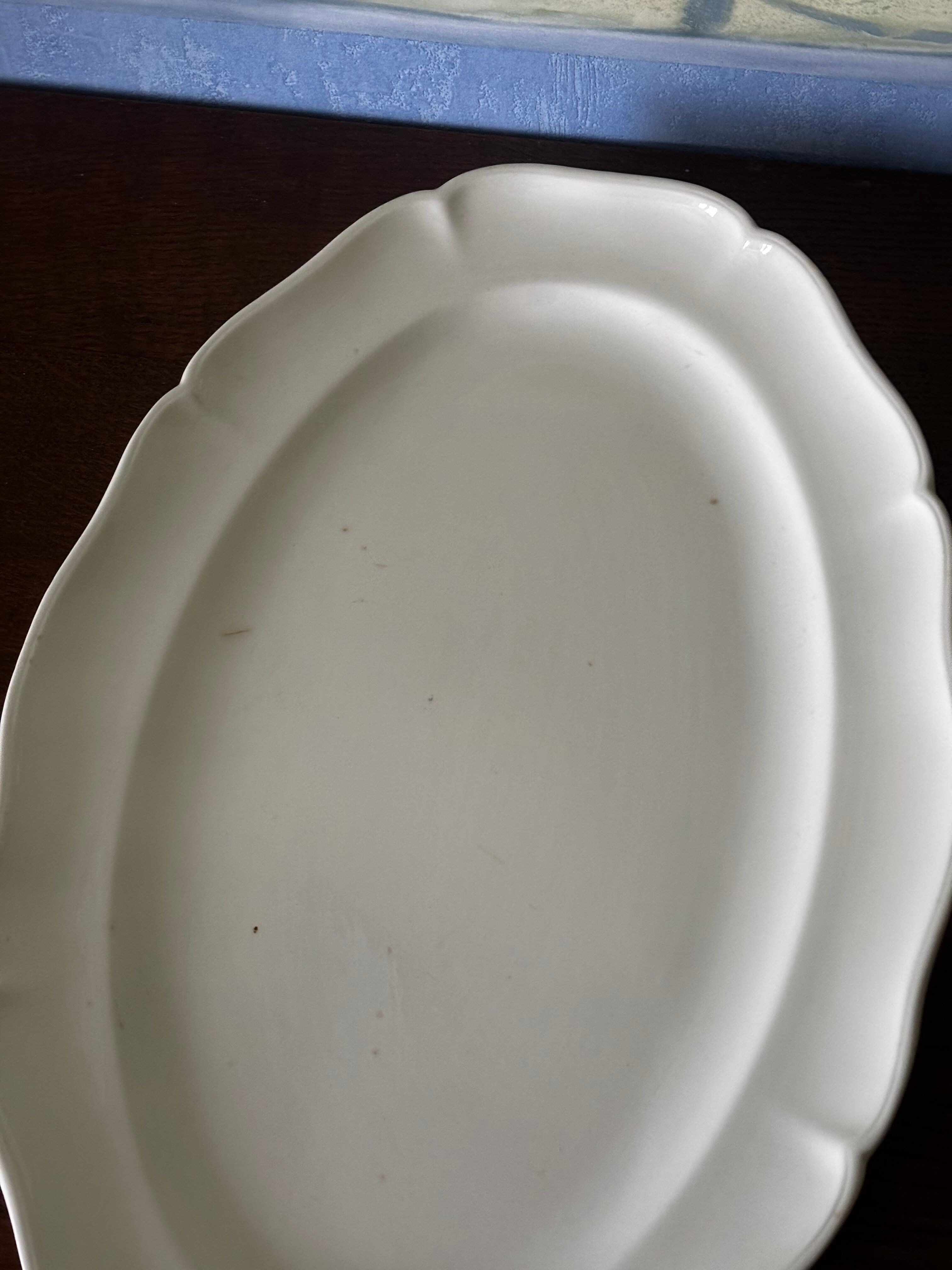 Old very large serving platter with scalloped edges by Villeroy and Boch.