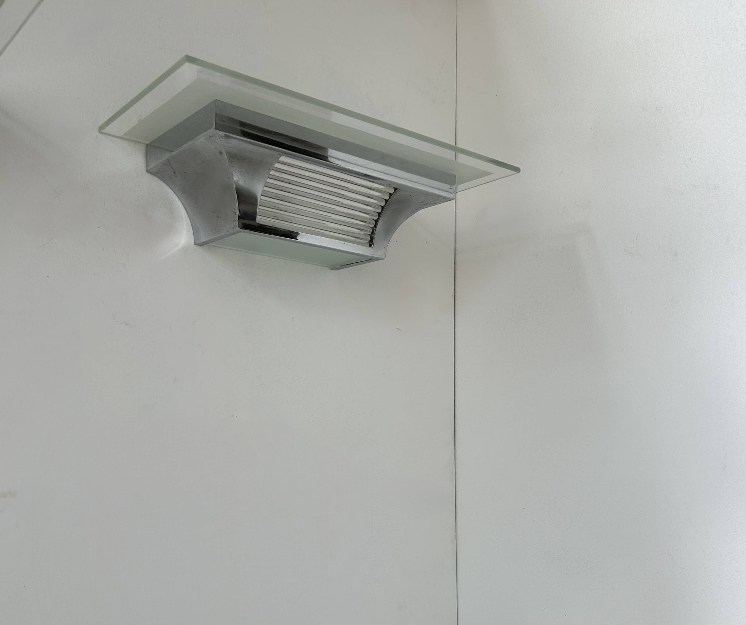 Pair of modernist Henri Petitot wall lights, chrome-plated brass, France, 1930