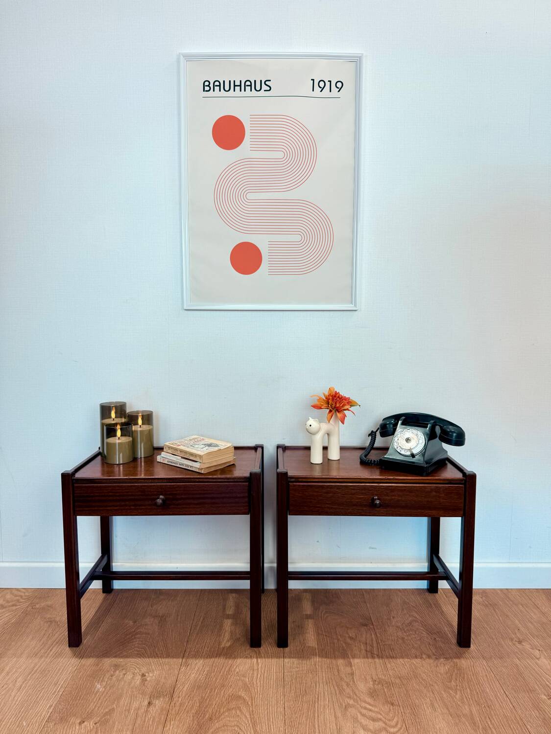 Pair of walnut bedside tables designed by Jacques Hauville for Roche Bobois.