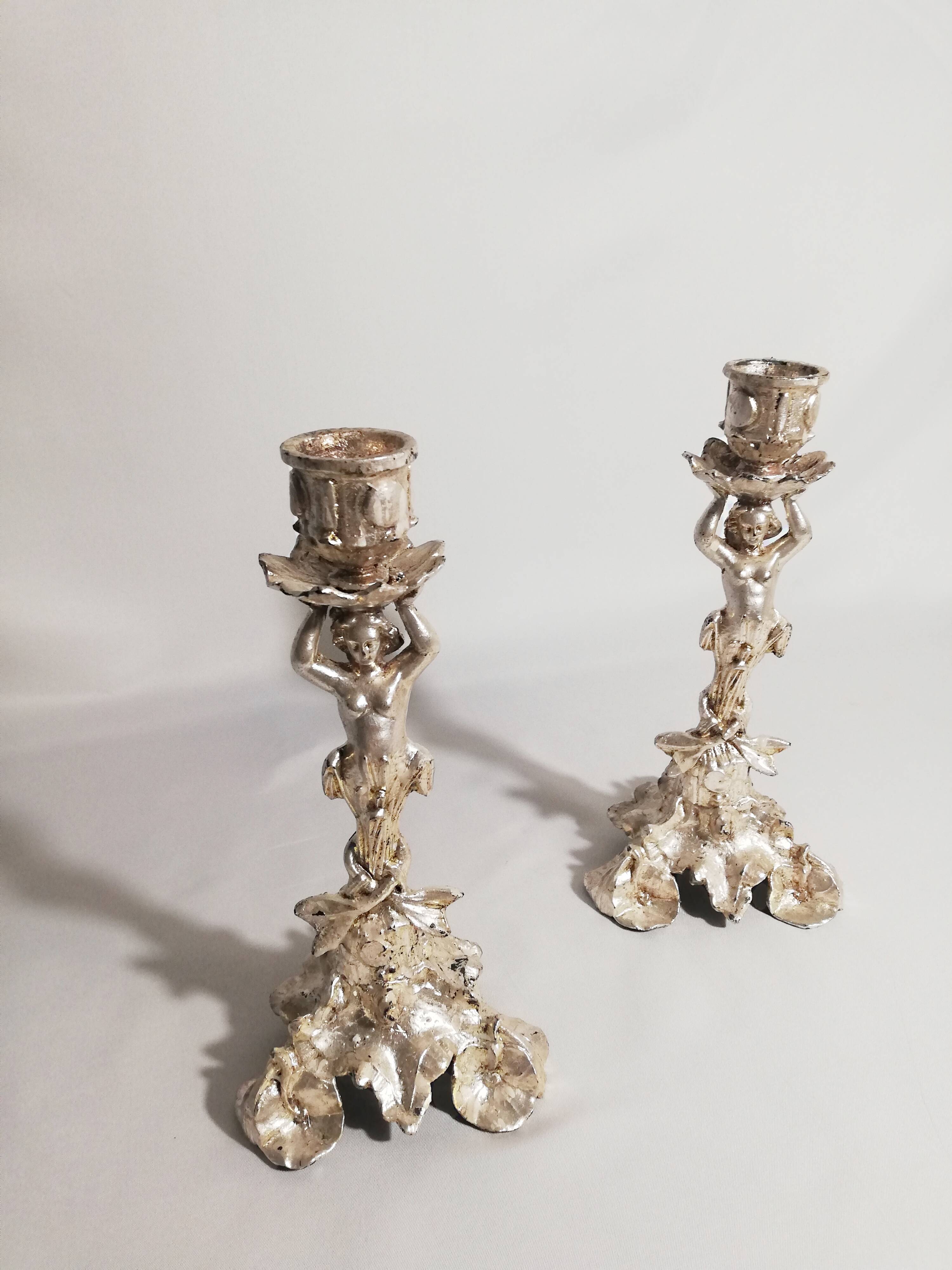 Pair of candlesticks restored to silver leaf