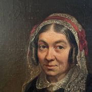 Late 19th century portrait representing a woman with a headdress and lace