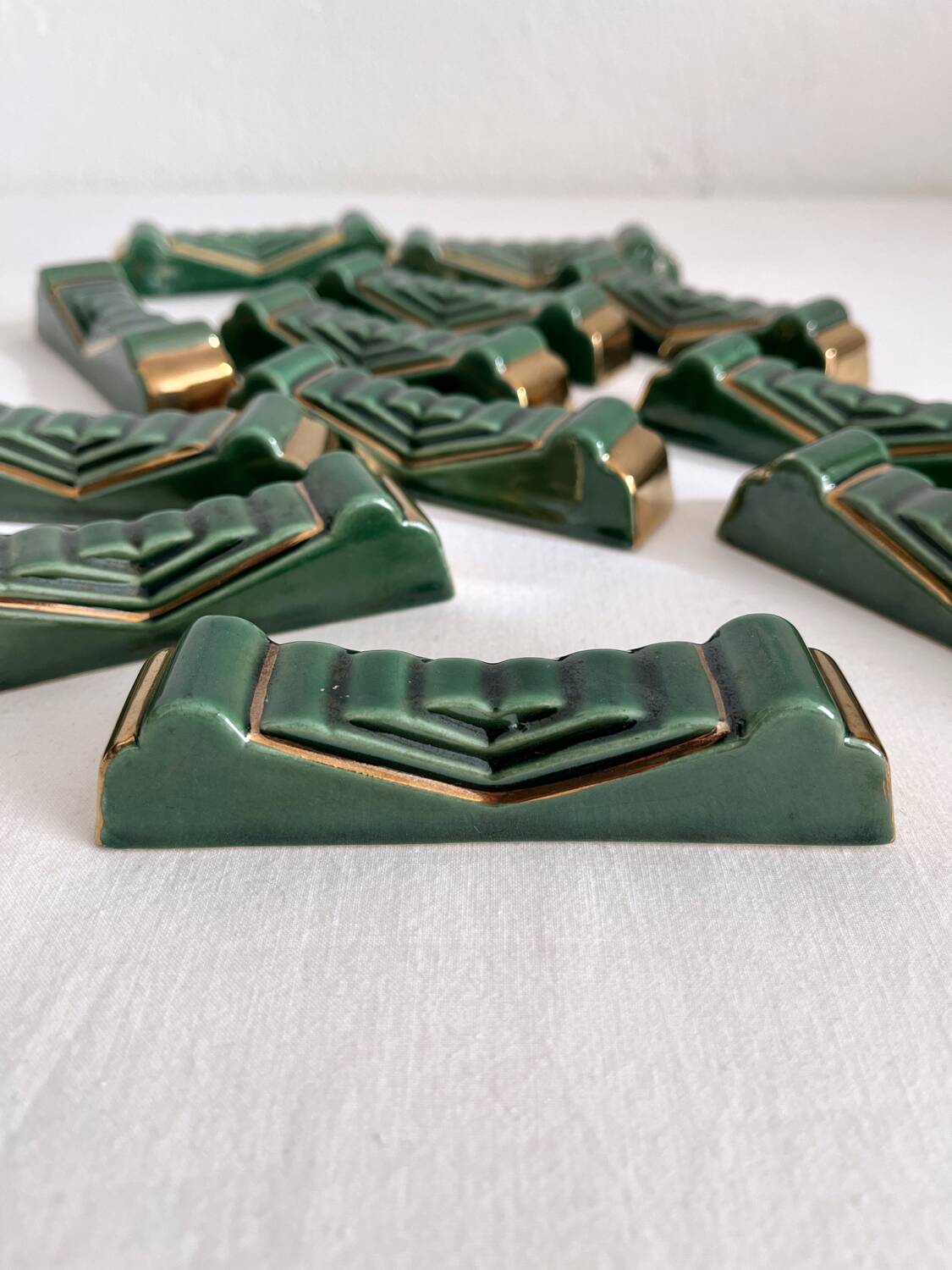 12 vintage green and gold ceramic knife holders from the 50s