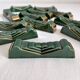 12 vintage green and gold ceramic knife holders from the 50s