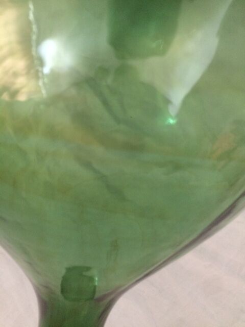 Demijohn with a beautiful glass mixing green and brown