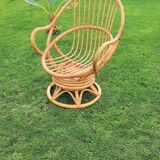 Pair of swivel rattan armchairs