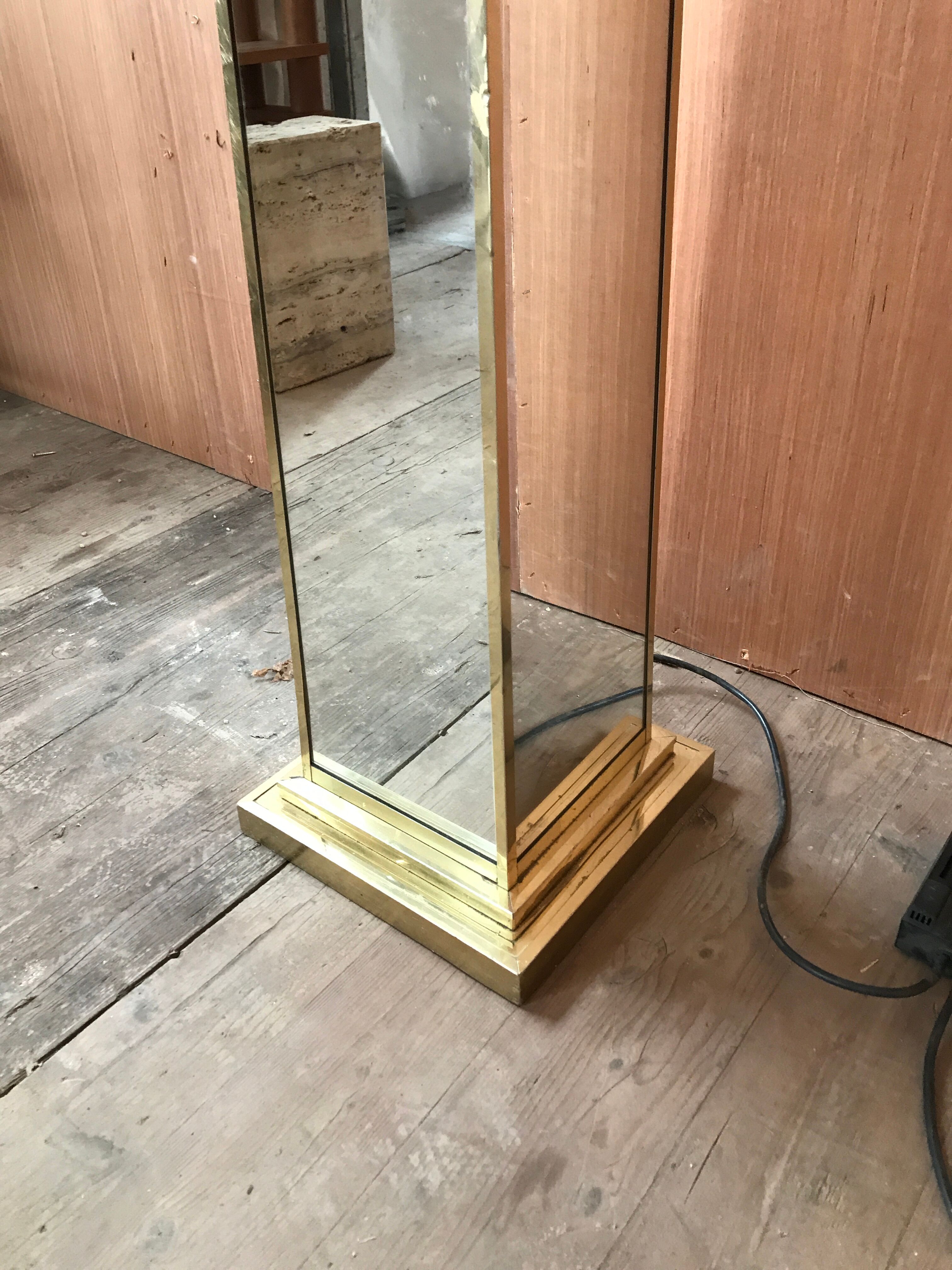 Mirror and gold metal lamppost