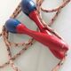 Old wooden jump rope red and blue / vintage