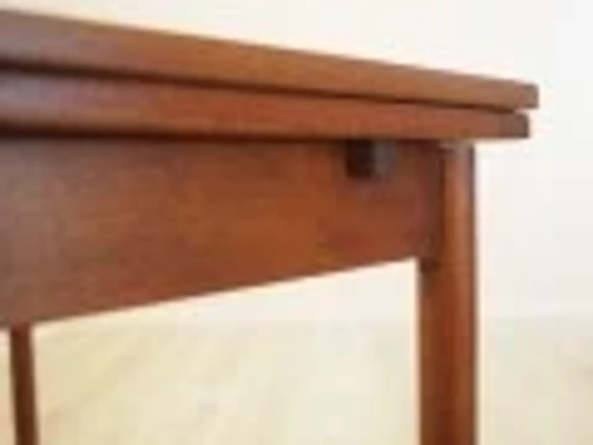 Danish teak extending dining table on solid wood legs, 1970s