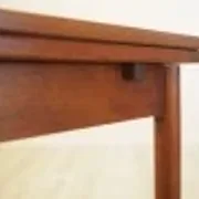 Danish teak extending dining table on solid wood legs, 1970s