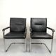 Paire de fauteuils de bureau cuir et structure tubulaire chromé