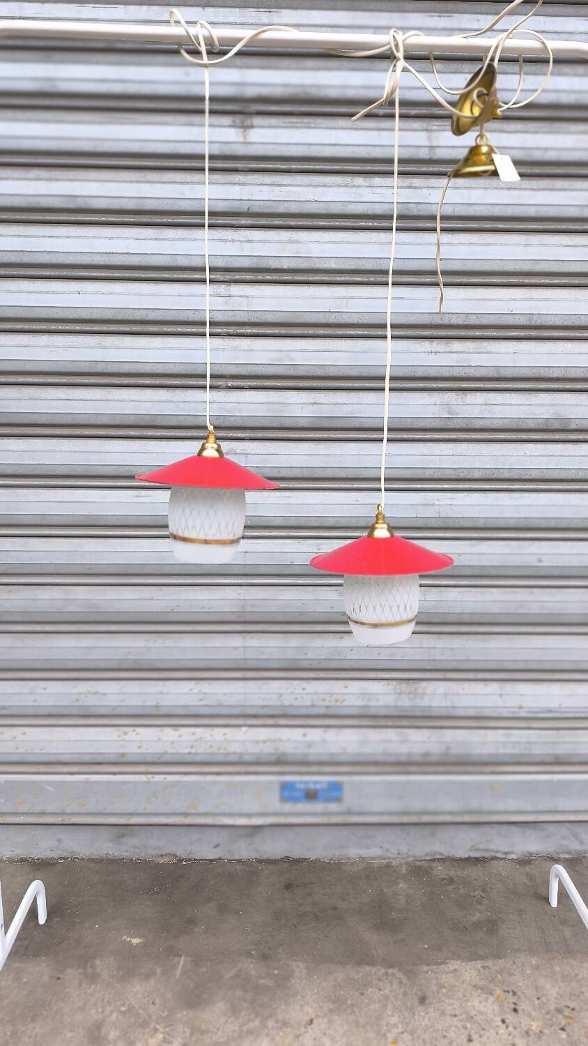 Pair of enamelled sheet metal and glass pendant lights