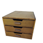 Small vintage wooden office cabinet with drawers.