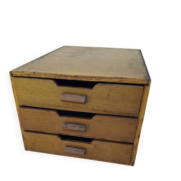 Small vintage wooden office cabinet with drawers.