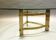 Coffee table  70s form free brass and glass