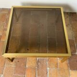 Table basse en verre et laiton