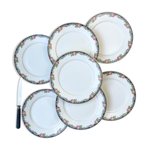 7 assiettes plates en porcelaine
