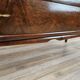 Chest of drawers with five drawers in wood and brass