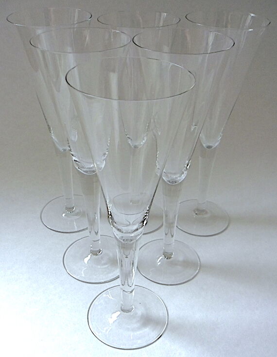 Suite of six colorless crystal champagne flutes