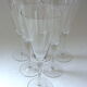 Suite of six colorless crystal champagne flutes