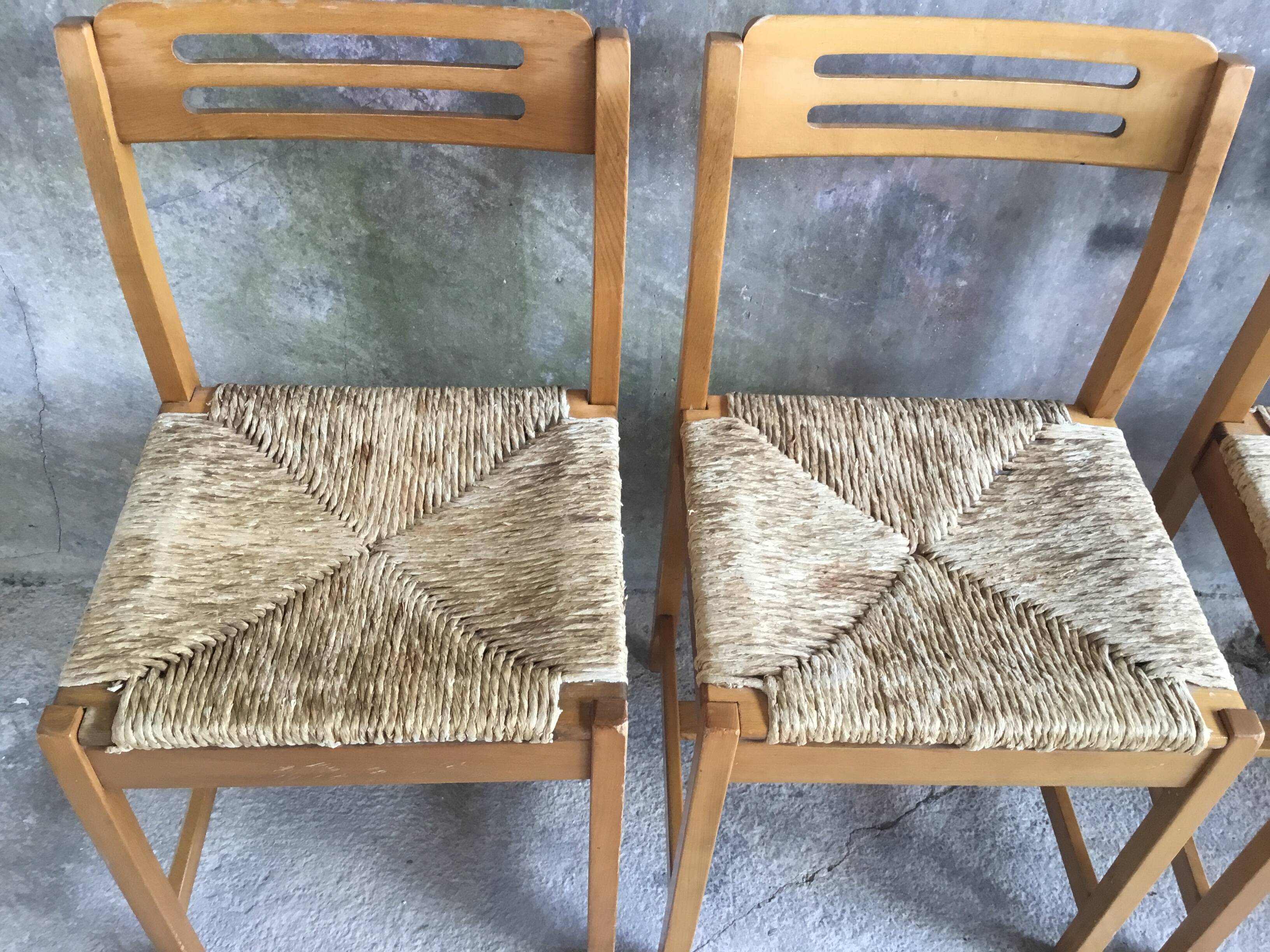 Set of 4 straw chairs in light wood - design 1970