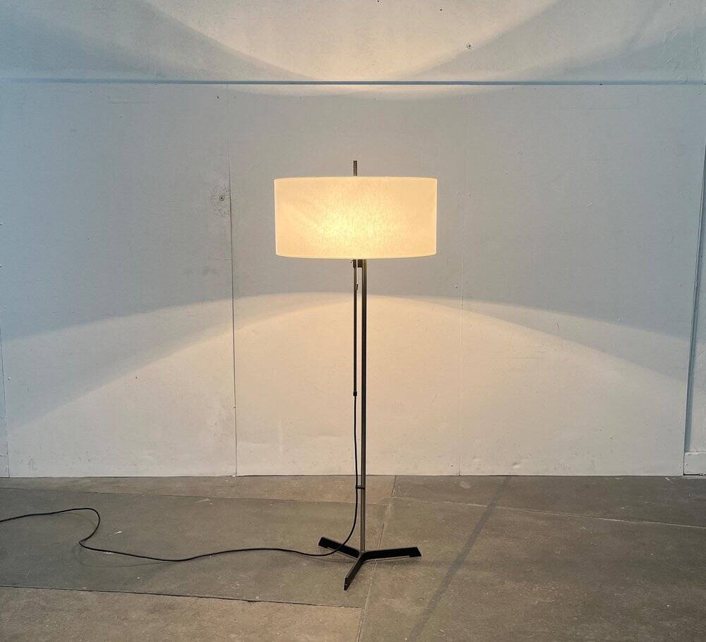 Mid-century German minimalist tripod floor lamp from the 1960s.