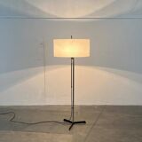 Mid-century German minimalist tripod floor lamp from the 1960s.