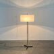Mid-century German minimalist tripod floor lamp from the 1960s.