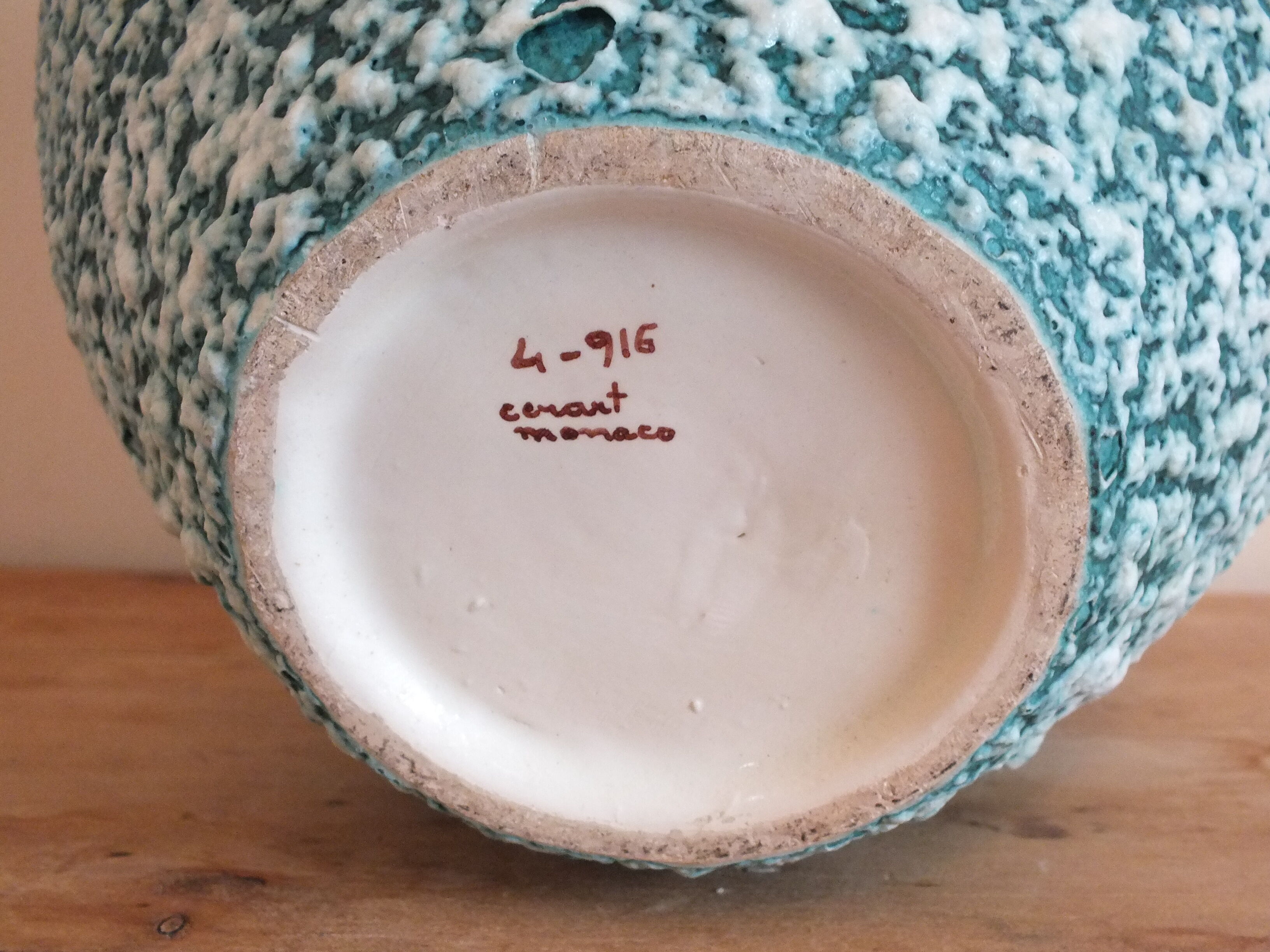 Green vase decorated with white enamels Cérart Monaco