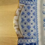 Plate with phosphatic porcelain decoration